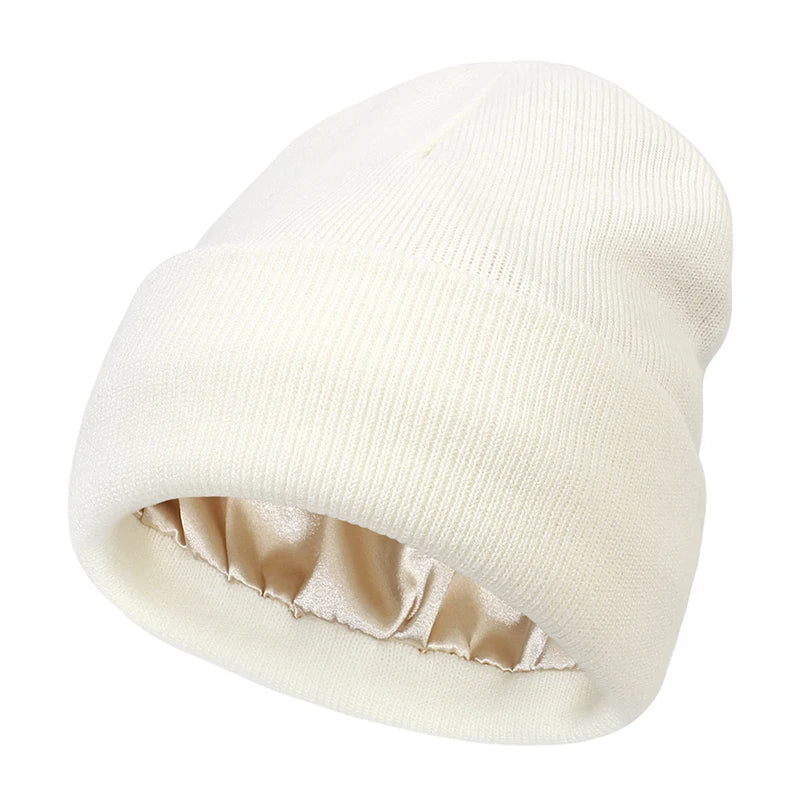Satin-lined women's beanie cap by Belro, winter hat accessory with a soft, cozy fabric and stylish design.