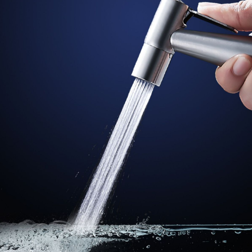 Belro handheld bidet spray attachment with self-cleaning feature, mounted on a bathroom wall for easy hygiene cleaning.