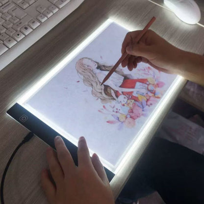 Belro A4 A5 ultra-thin LED drawing tablet for tracing and sketching, shown with stylus on a smooth surface.
