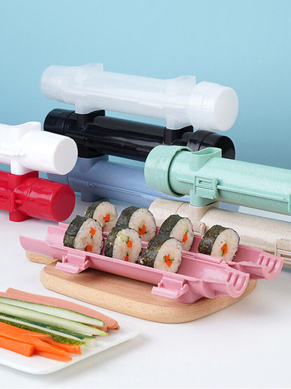 Belro Sushi Bazooka for home sushi making, showing the plastic device and fresh rice and fish ready to roll.