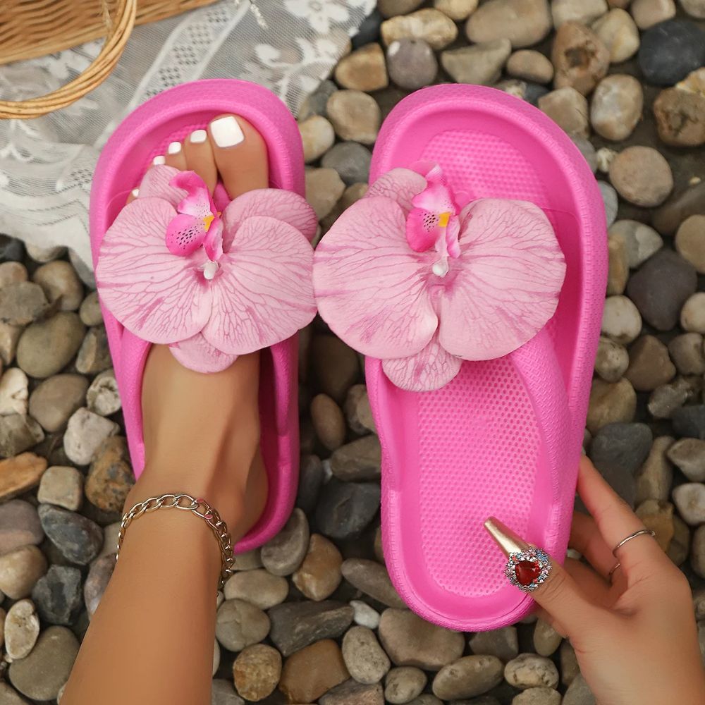 Belro ladies tropical orchid summer flip flops with colorful floral design and comfortable slip-on sandal style.