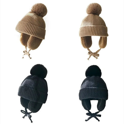 Kids knit beanie winter hat with earflaps in cozy wool, featuring a colorful striped pattern, by Belro.