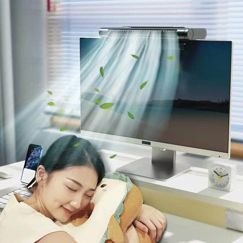 Belro USB bladeless fan and desktop air conditioner on a desk, compact electronic home appliance for cooling.