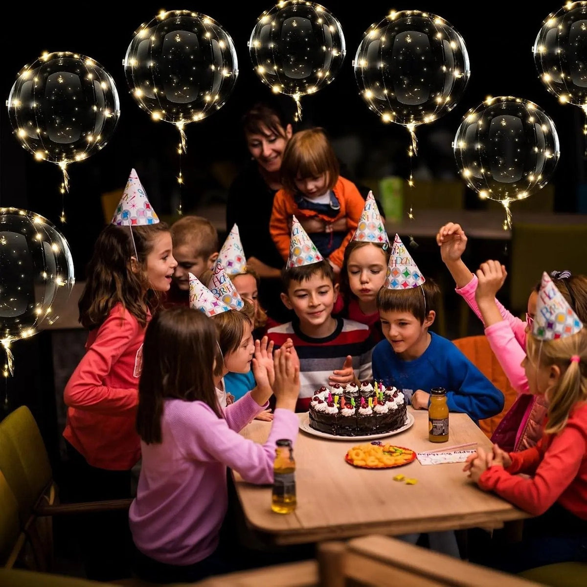 Set of 10 Mivoza LED balloons with warm glowing light, reusable party decorations, featuring colorful 3D balloon designs.