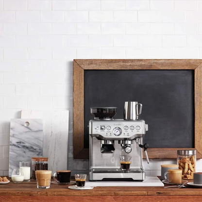 Casavibeo Breville Barista Express in brushed stainless steel, featuring a sleek espresso machine with built-in grinder and steam wand.