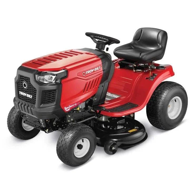 Casavibeo Troy-Bilt Bronco 42-inch riding lawn mower with black seat and cutting deck, ready for outdoor grass trimming.