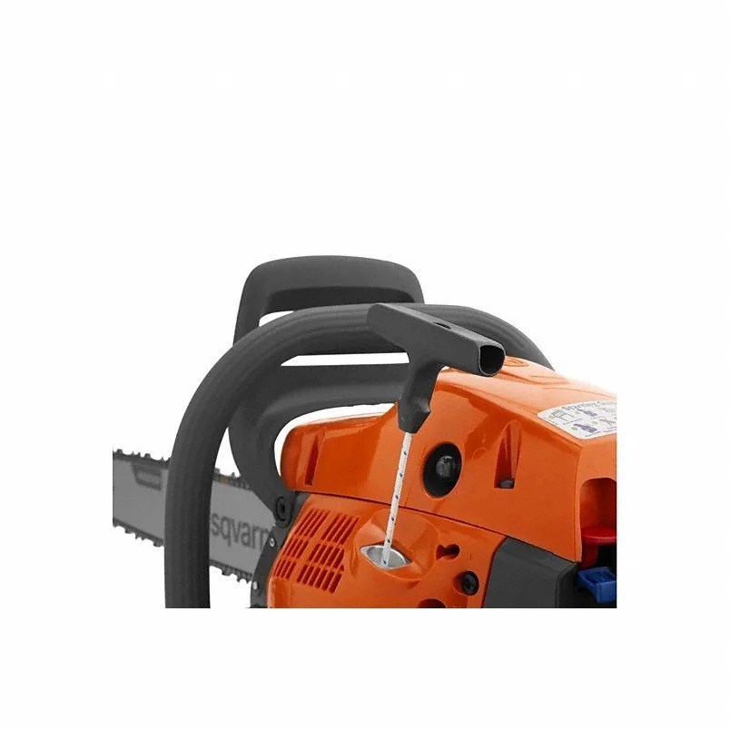 Husqvarna 562 XP® Mark II chainsaw with metal guide bar and chain, displayed outdoors in a natural setting.