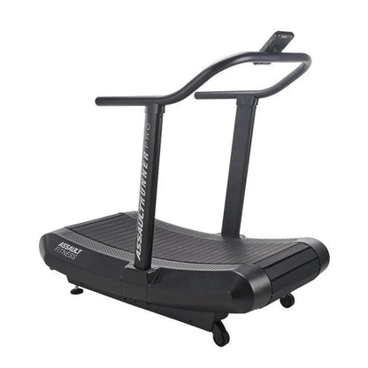 Casavibeo Assault Fitness AssaultRunner Pro treadmill showing a sleek running surface and control panel in a modern gym setting.