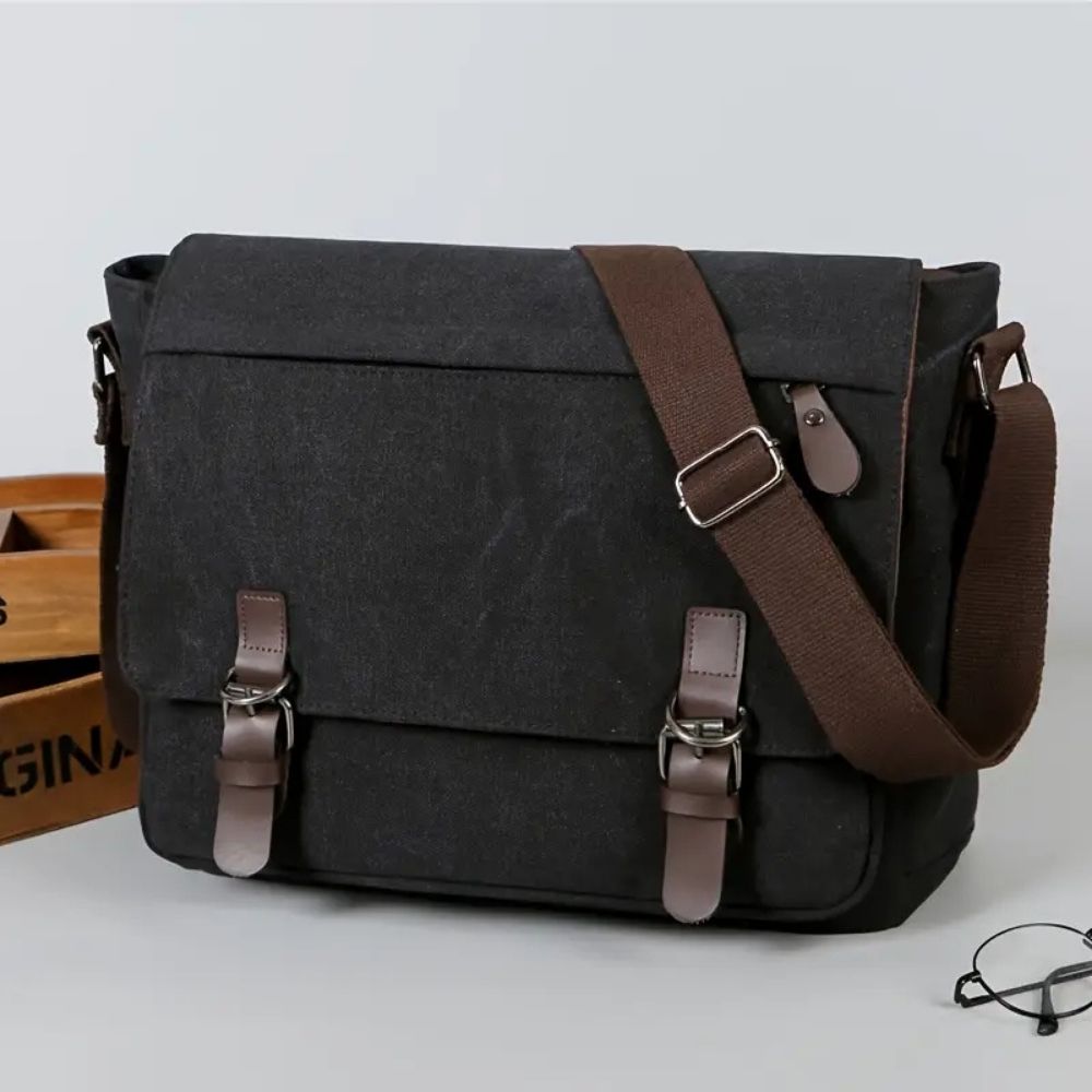 Men's Belro canvas satchel messenger bag with adjustable strap and multiple compartments, perfect for everyday use.