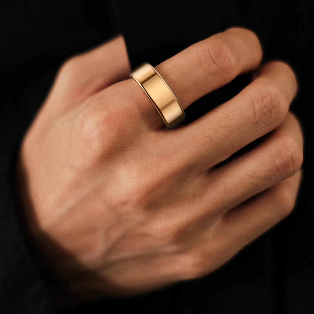 Belro smart ring for sleep and fitness tracking, close-up view showing sleek black design and sensor details.