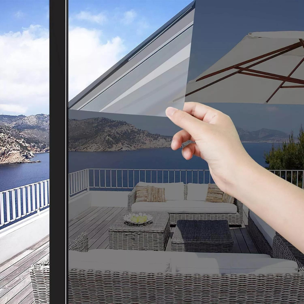 Belro reflective one-way privacy window insulation film installed on a glass window, providing privacy and insulation for homes.