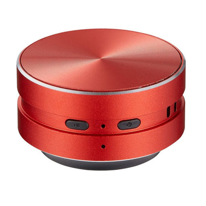 Belro Bone Induction Speaker attached to a surface, showcasing portable electronic audio device that turns surfaces into speakers.