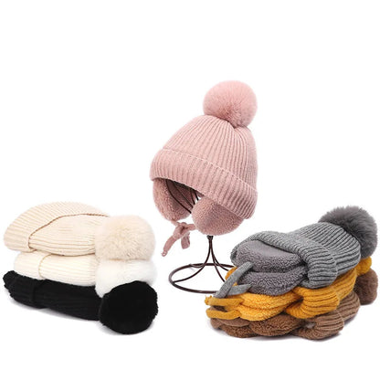 Kids knit beanie winter hat with earflaps by Belro, soft, cozy, and warm for children, featuring a colorful knit pattern and earflap design.