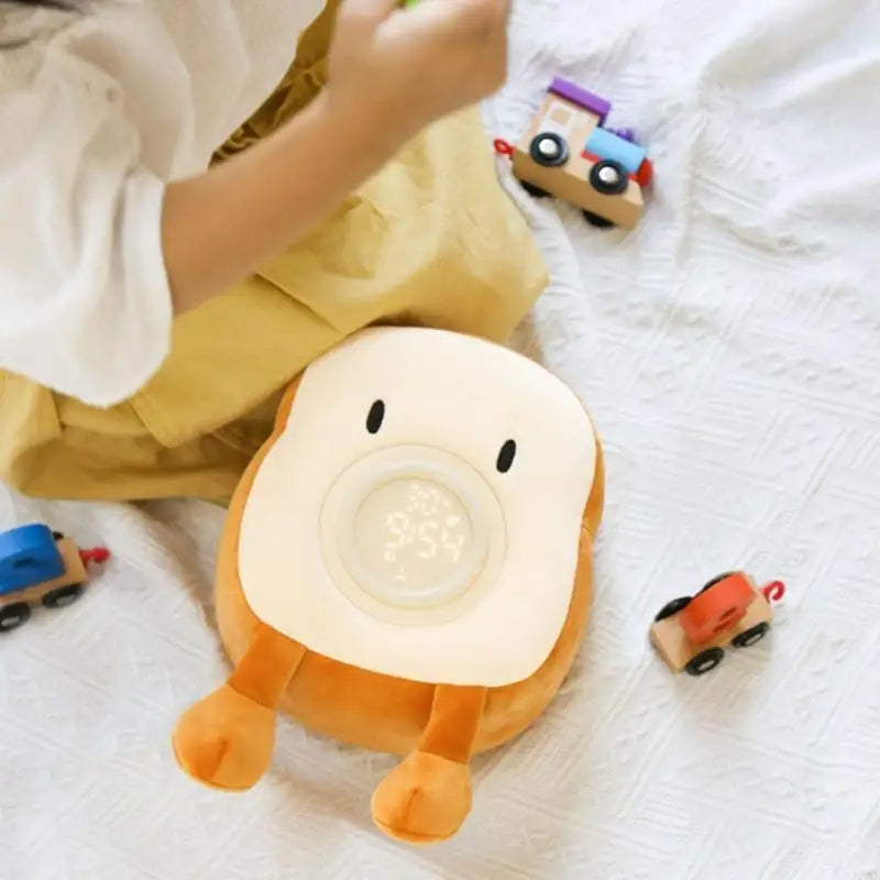 Belro alarm clock plushie with integrated night light, soft fabric, and cute design, perfect for bedside decor and nighttime comfort.
