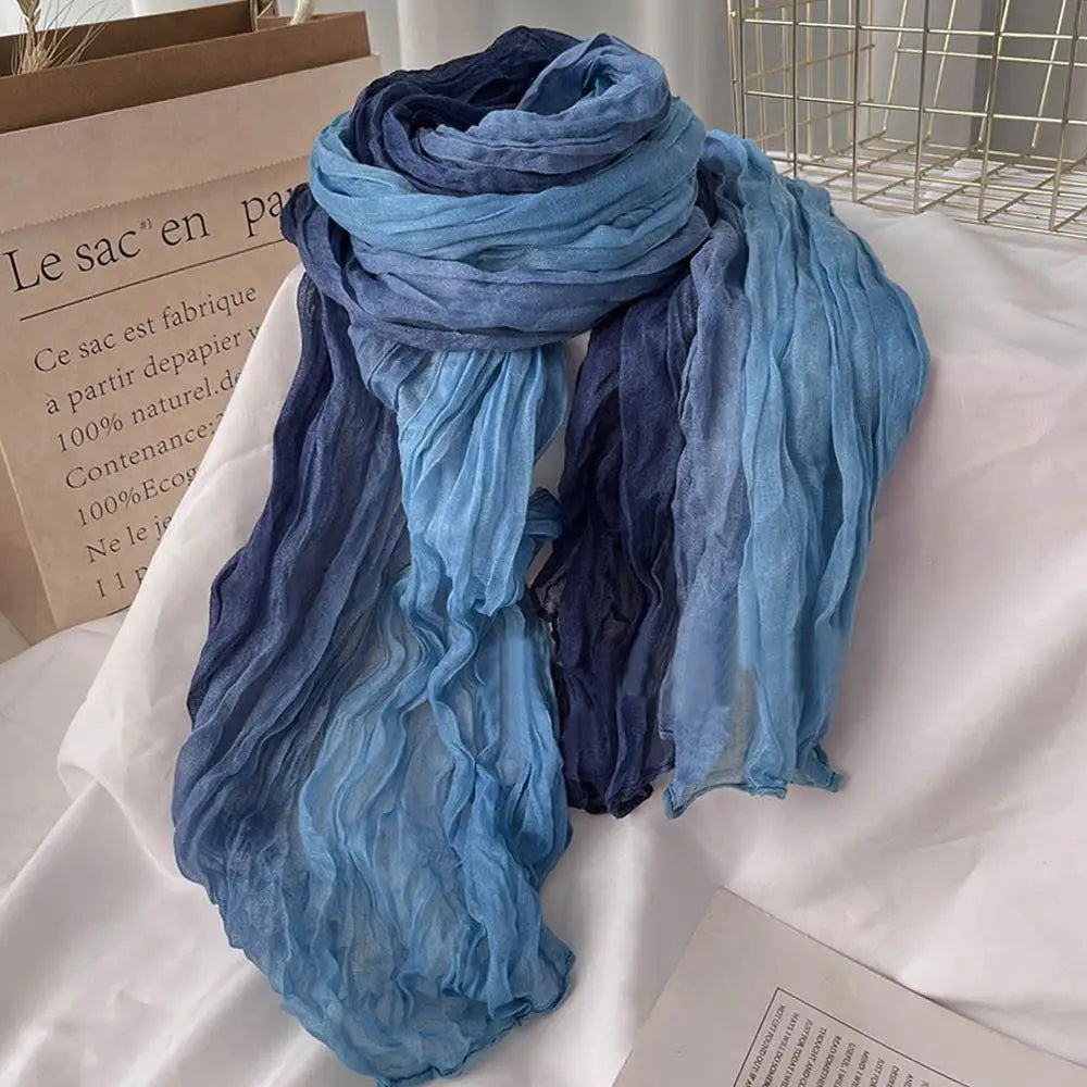 Soft gradient cotton shawl by Belro, a stylish ladies winter scarf with a cozy wrap-around design and smooth fabric.