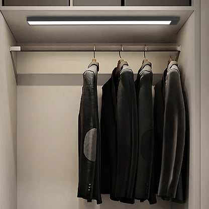 Belro motion sensor closet cabinet light illuminating a storage space with automatic on/off functionality.