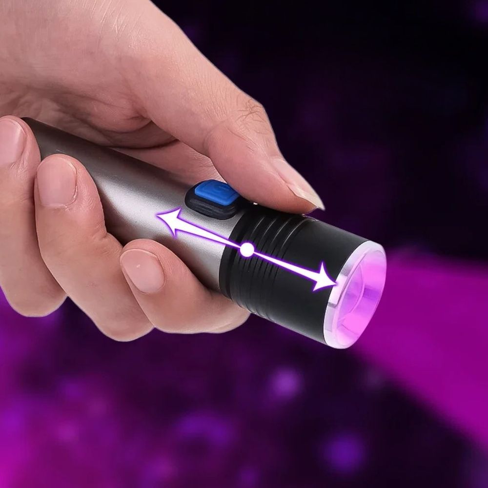 Belro handheld blacklight UV ultraviolet urine detector flashlight for men, showing the compact device with UV light in use.