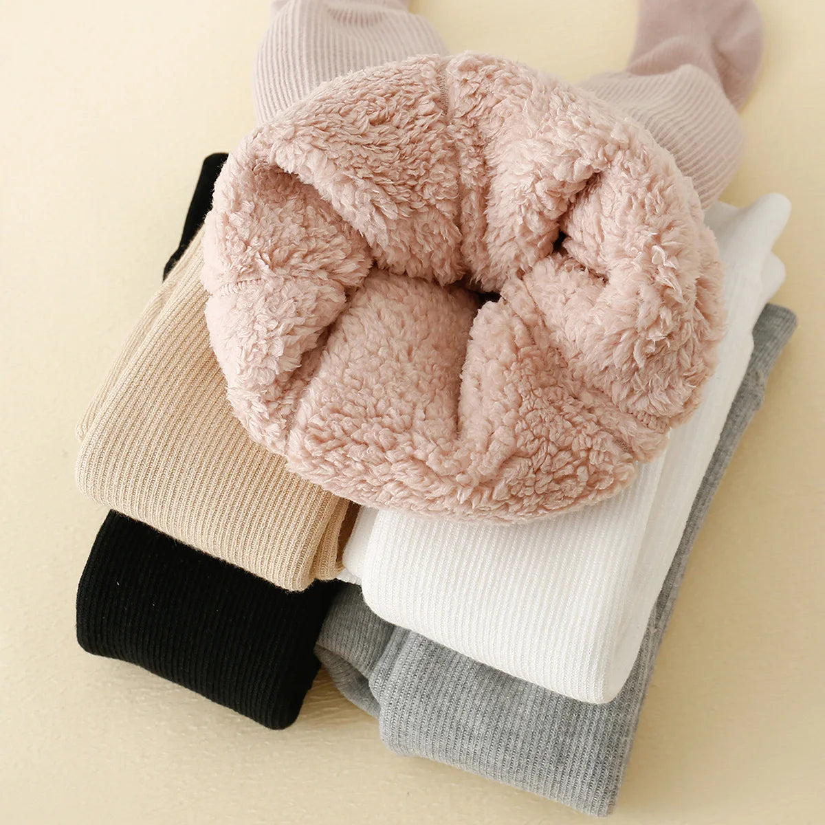 Kids winter fleece-lined leggings by Belro, soft and warm clothing for children, showing the cozy fleece interior and stretchy fit.