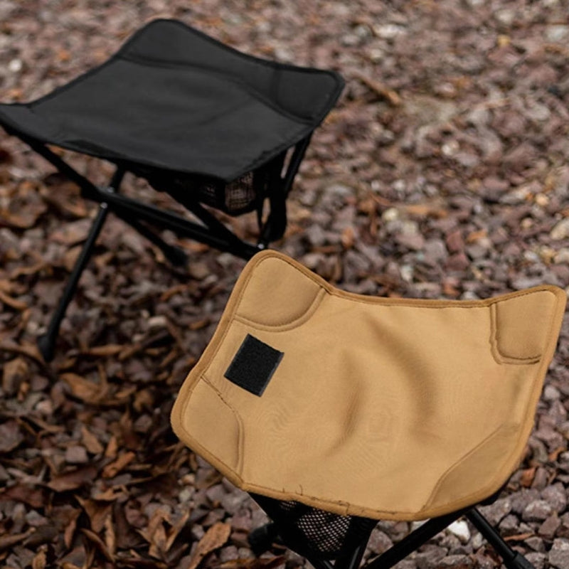 Mivoza folding camping stool with lightweight design and storage net, suitable for outdoor garden and camping use.