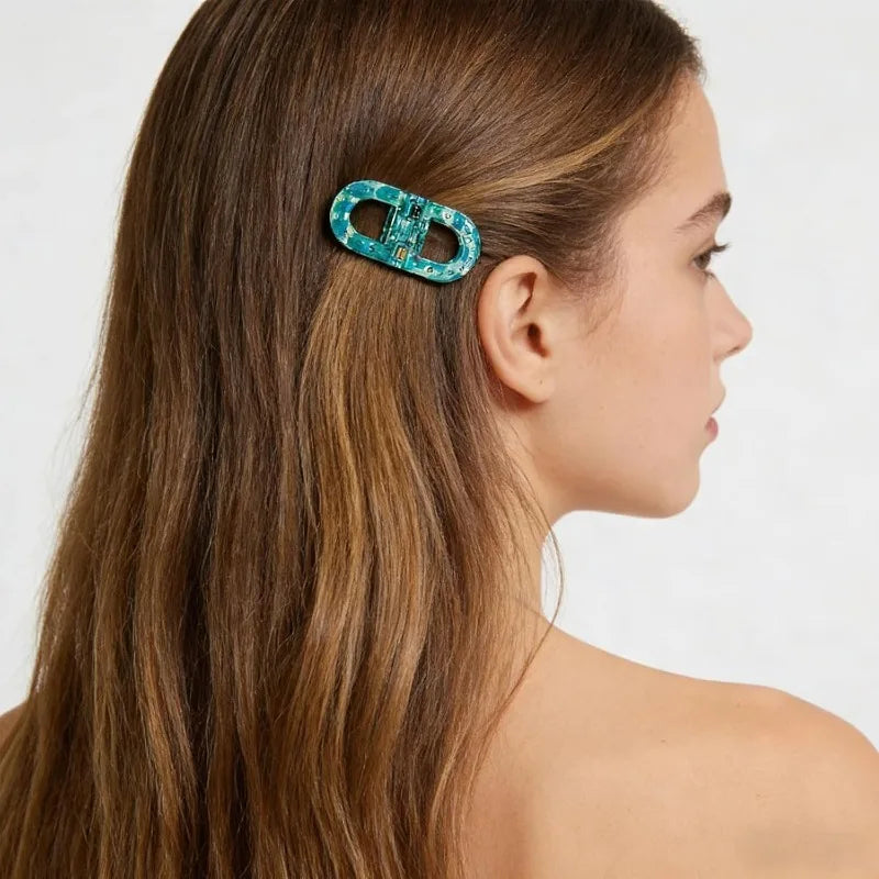Set of four Belro magnetic hair clips with strong hold, designed for stylish and secure hair styling.