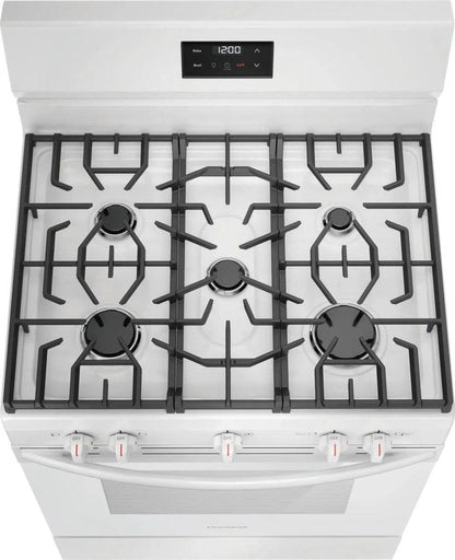 Casavibeo Frigidaire 30-inch gas range with four burners and oven, stainless steel finish, and control knobs on the front.