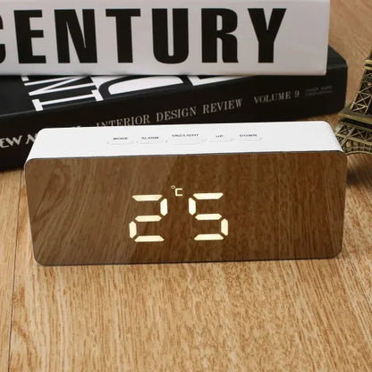 Belro digital alarm clock with smart mirror display, bedside nightlight, and modern home decor design on a desktop.