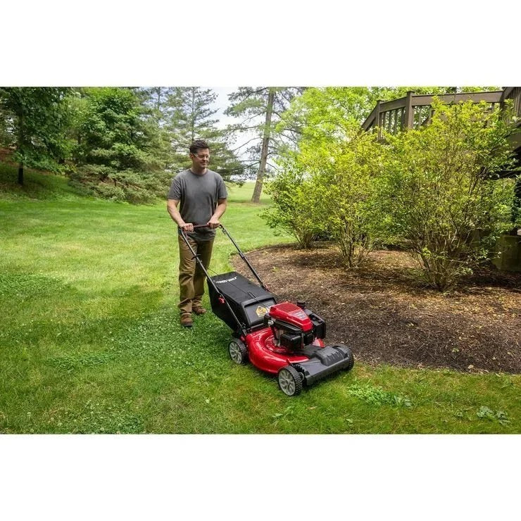 Casavibeo Troy-Bilt TB200C self-propelled lawn mower with a cutting deck, engine, and adjustable handle for easy yard work.