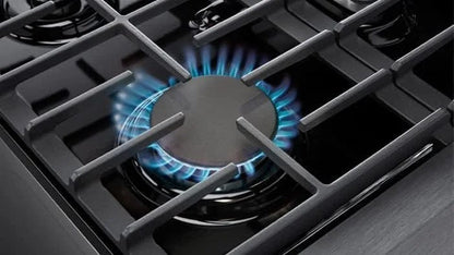 Casavibeo Thor Kitchen 36-inch gas range with four burners and stainless steel finish, shown in a modern kitchen setting.