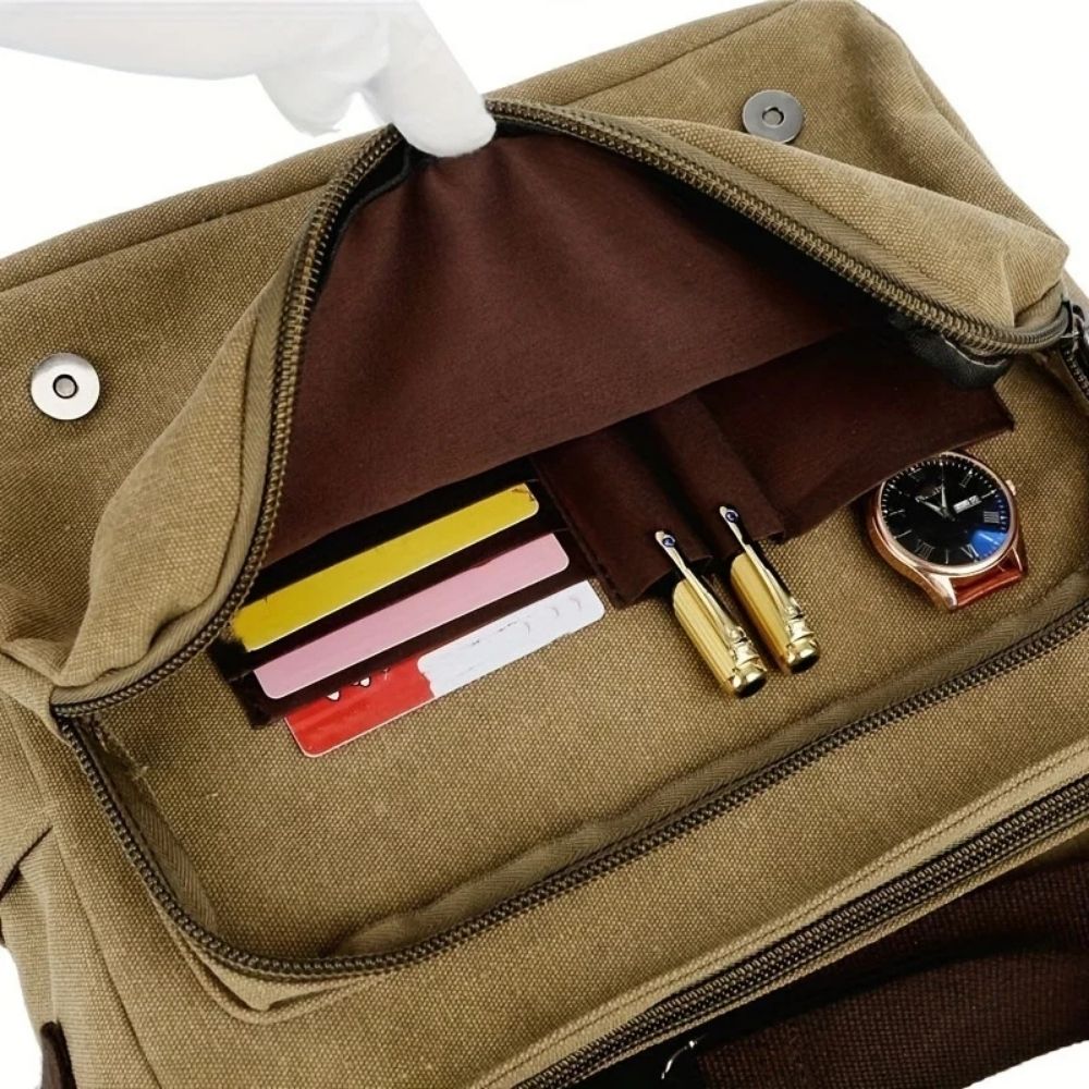 Belro men's canvas satchel messenger sling bag with adjustable strap and multiple compartments, perfect for everyday carrying.