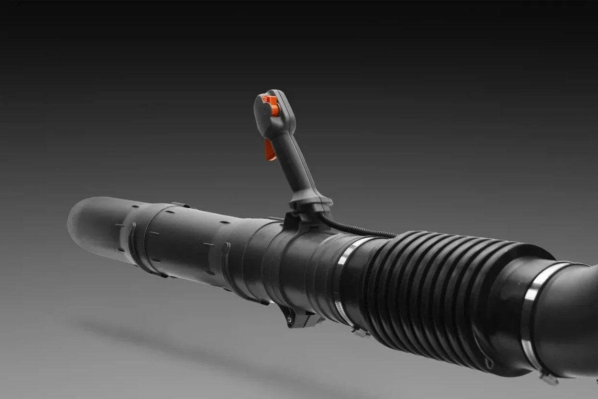 Husqvarna 580BTS gas backpack blower with adjustable straps and powerful engine, shown in a close-up view.