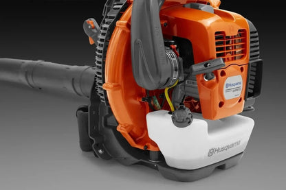 Casavibeo Husqvarna 580BTS gas backpack blower with large engine and ergonomic straps, ready for outdoor yard cleanup.