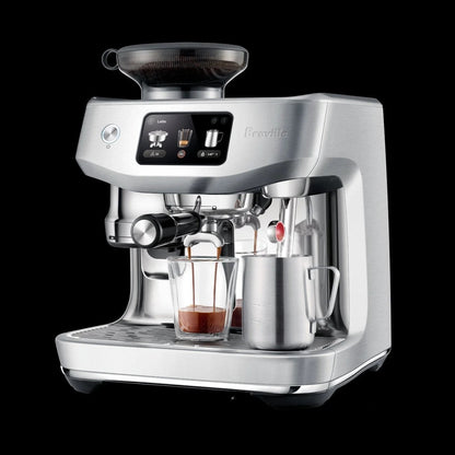Casavibeo Breville The Oracle Jet espresso machine with stainless steel finish and digital display on countertop.