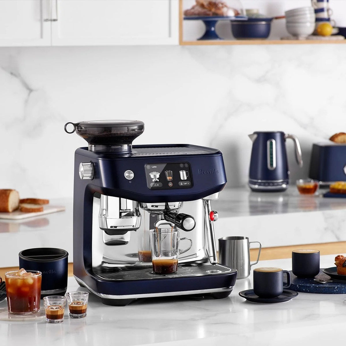 Casavibeo Breville Oracle Jet espresso machine with digital display, stainless steel finish, and built-in coffee brewing system.