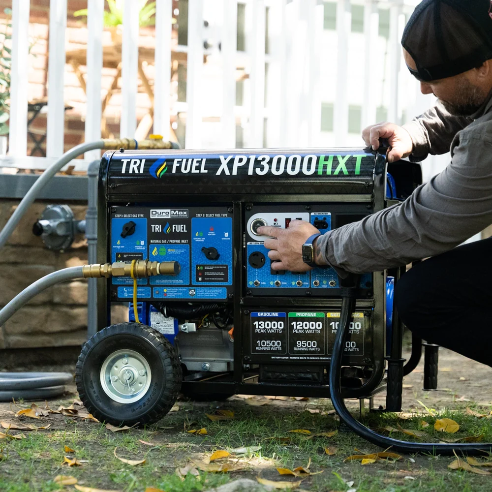 DuroMax XP13000HXT tri-fuel generator with remote start, gasoline, propane, and natural gas options, shown in the image.
