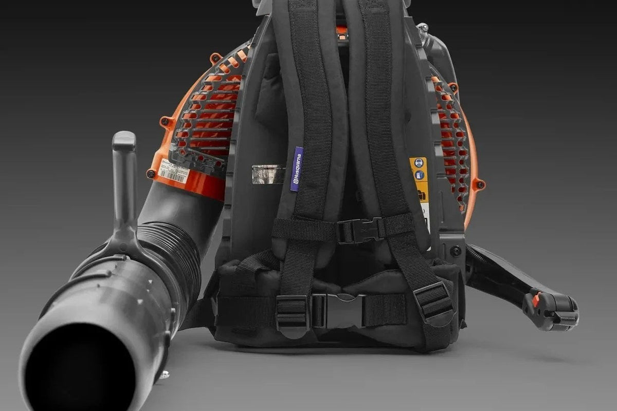 Casavibeo Husqvarna 580BFS Mark III backpack blower with large air intake and ergonomic harness for powerful leaf clearing.