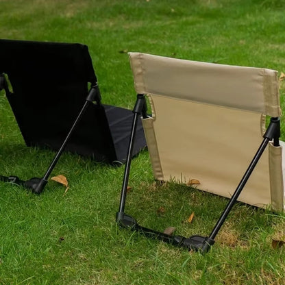 Mivoza foldable outdoor floor chair with back support, ideal for camping and picnics in garden or outdoor settings.
