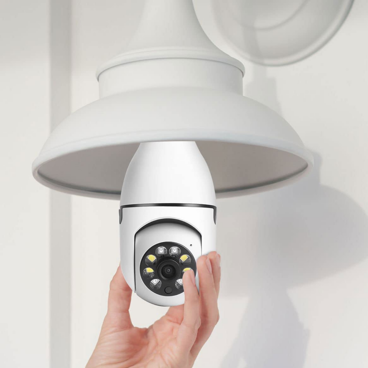 Belro smart WiFi indoor/outdoor security light bulb camera mounted outdoors, showing camera lens and light fixture.