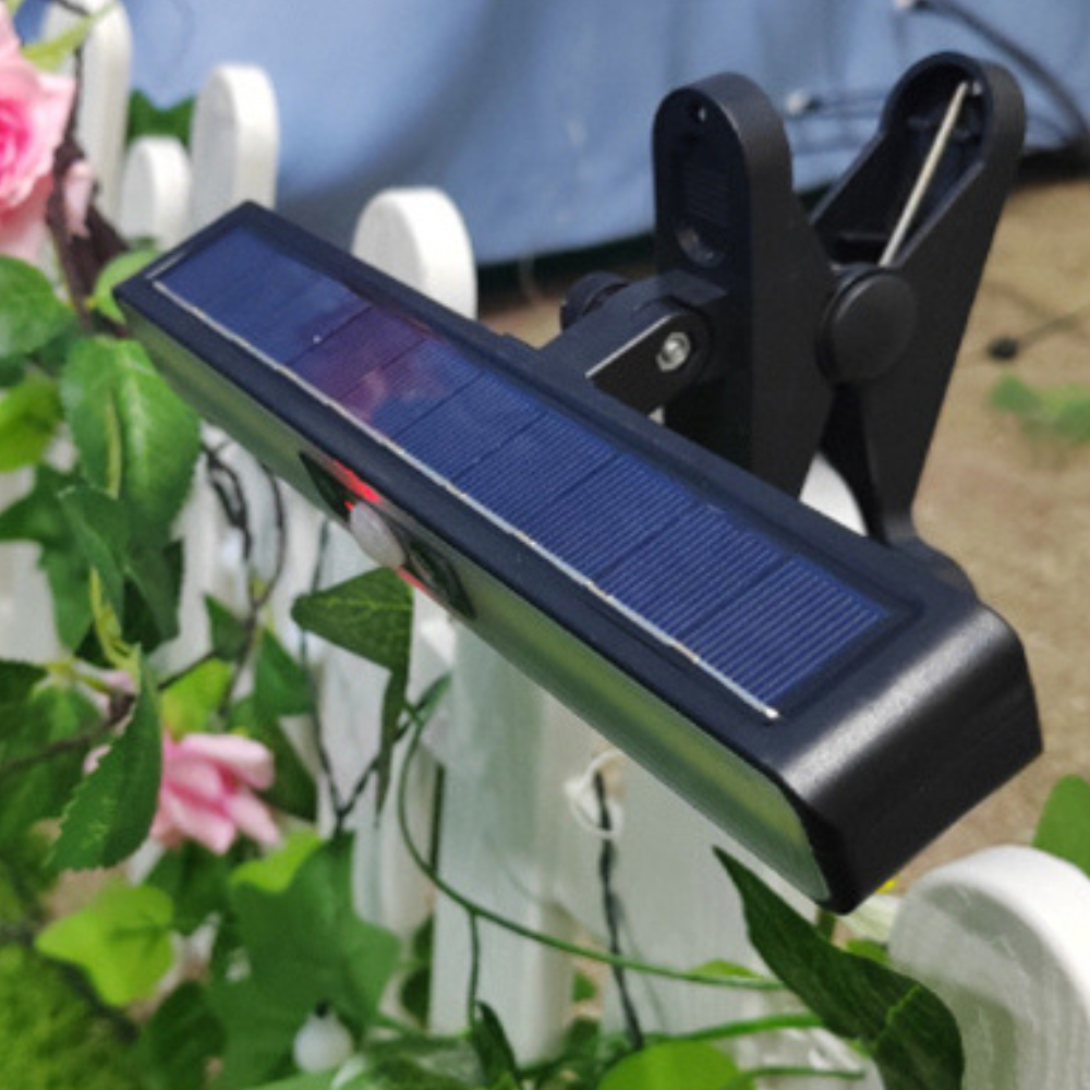 Belro waterproof solar-powered outdoor garden landscape lamp illuminating a garden path at dusk.