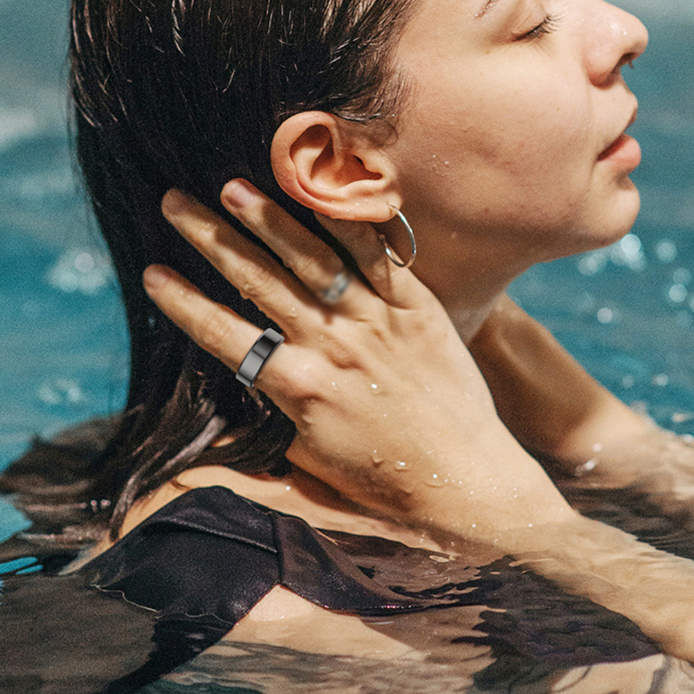 Belro smart ring for sleep and fitness tracking, showing sleek design and wearable technology on a user's finger
