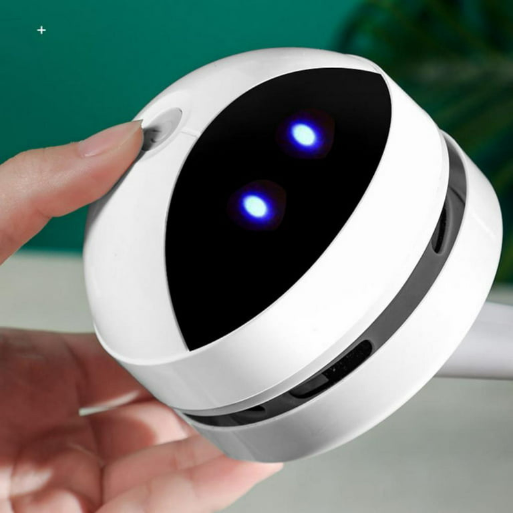 Belro compact USB charging mini desk vacuum cleaner robot for electronics cleaning, with a sleek black design and small brush attachment.