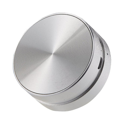 Belro Bone Induction Speaker showing a sleek black design, demonstrating how it turns surfaces into audio sources.