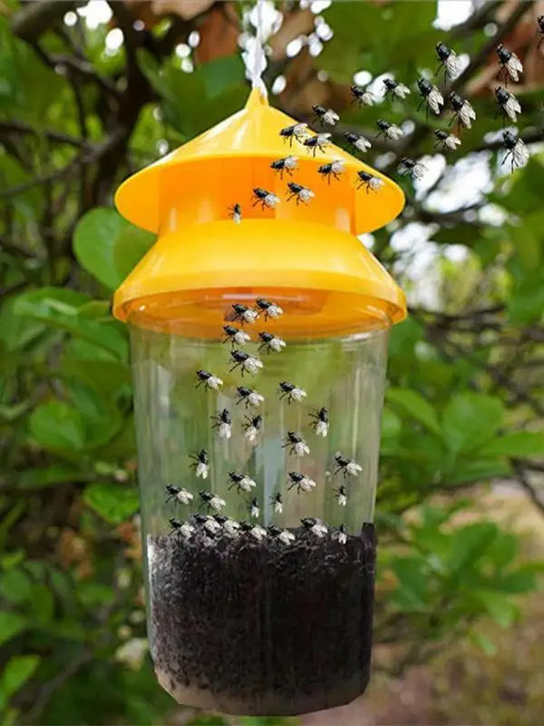 Belro reusable outdoor hanging fly trap in a garden setting, designed for pest control and insect trapping in outdoor spaces.