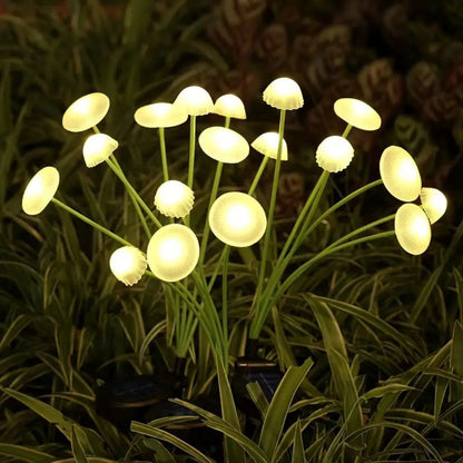 Belro Solar Swaying Mushroom garden decor lights in outdoor yard, glowing at dusk with colorful mushroom design and swaying motion.