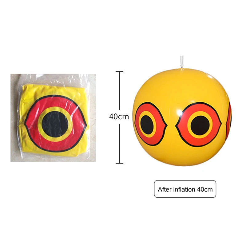 Belro inflatable scare eye balloon bird repeller in outdoor garden setting, designed to deter pest birds naturally.
