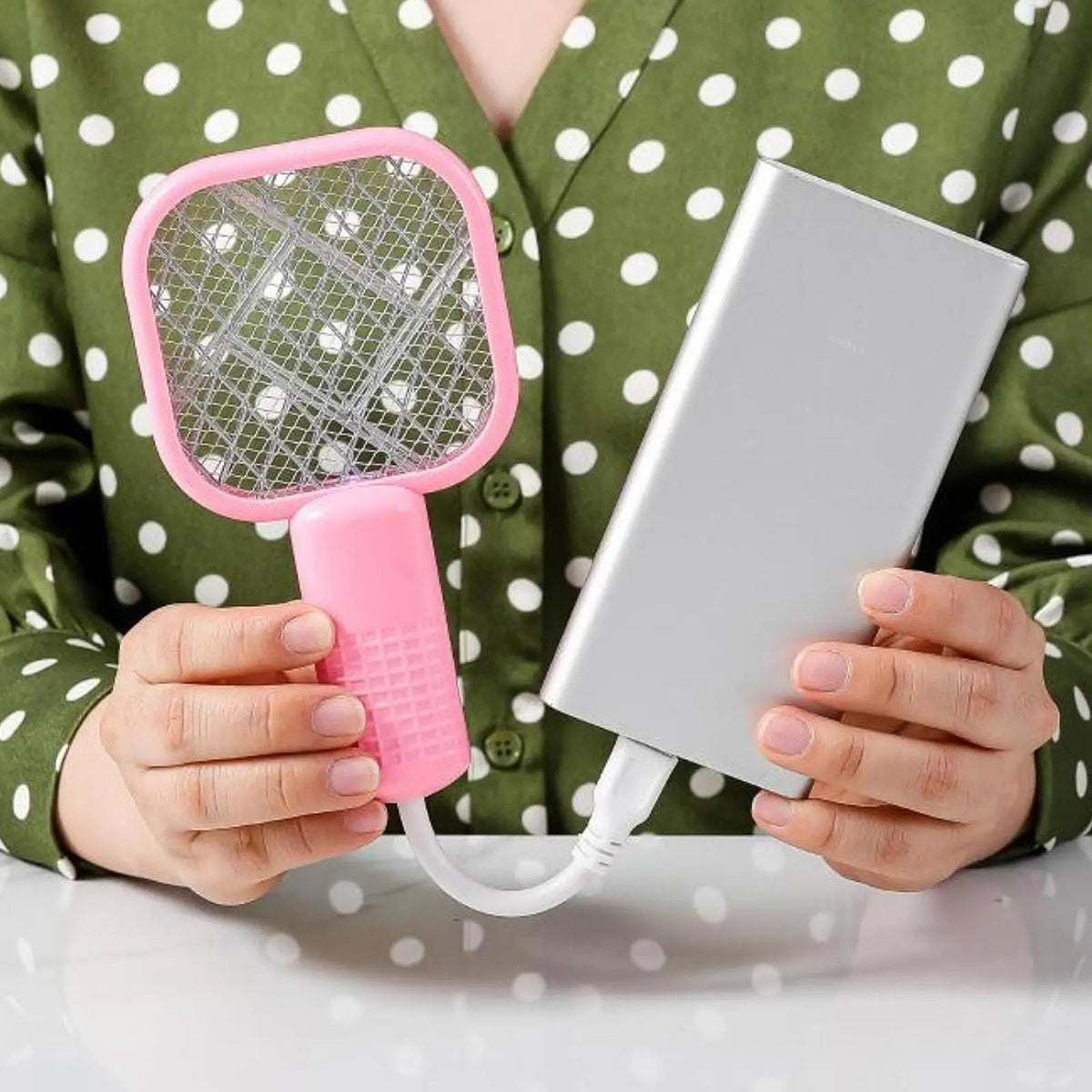 Belro compact USB mosquito zapper connected to a laptop, portable electronic device for insect control.