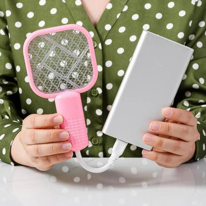 Belro compact USB mosquito zapper connected to a laptop, portable electronic device for insect control.