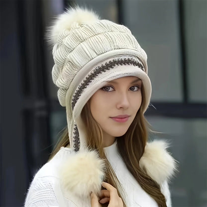 Belro fleece-lined winter hat with faux fur pom pom, cozy and warm accessory for cold weather, featuring a stylish winter cap design.