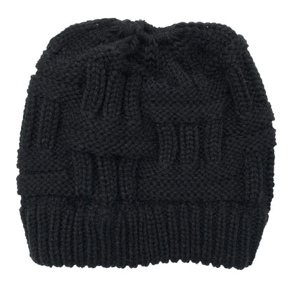 Women’s winter knit beanie hat with ponytail opening by Belro, cozy knit cap for cold weather, stylish winter accessories.