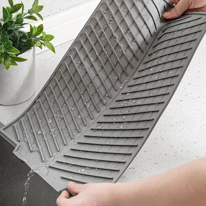 Belro silicone dish drying mat with drain design, flexible, non-slip surface for kitchen use, drying dishes and utensils comfortably.