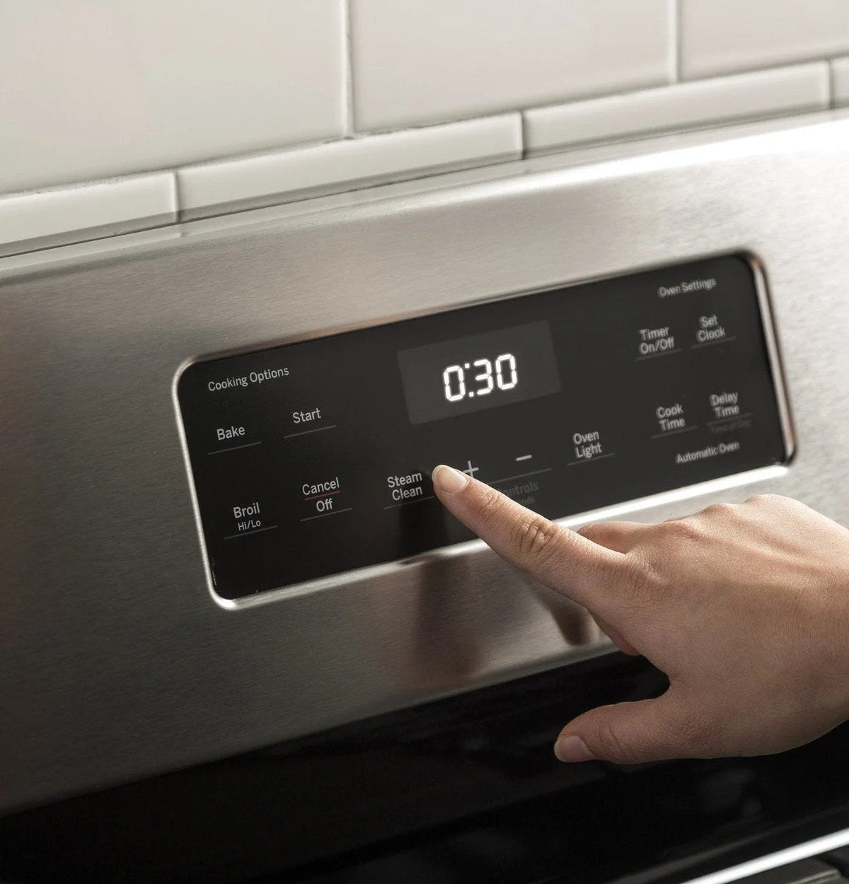 Casavibeo 30-inch freestanding gas range with four burners and oven, stainless steel finish, and control knobs on the front.